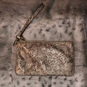 Gold snake print wristlet